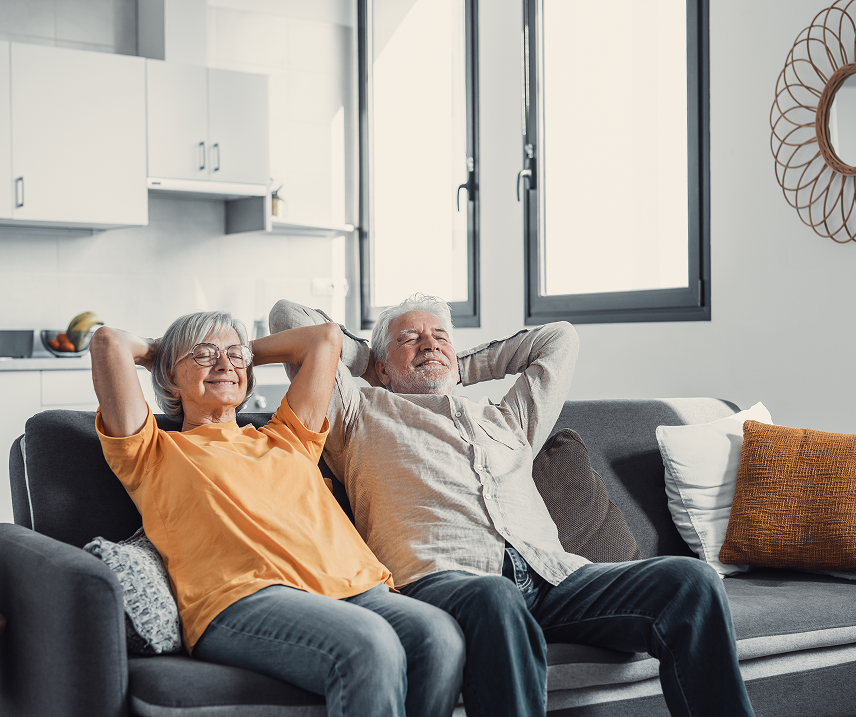 Family enjoying time together in a modern living room with a friendly home assistant robot highlight - smart tech